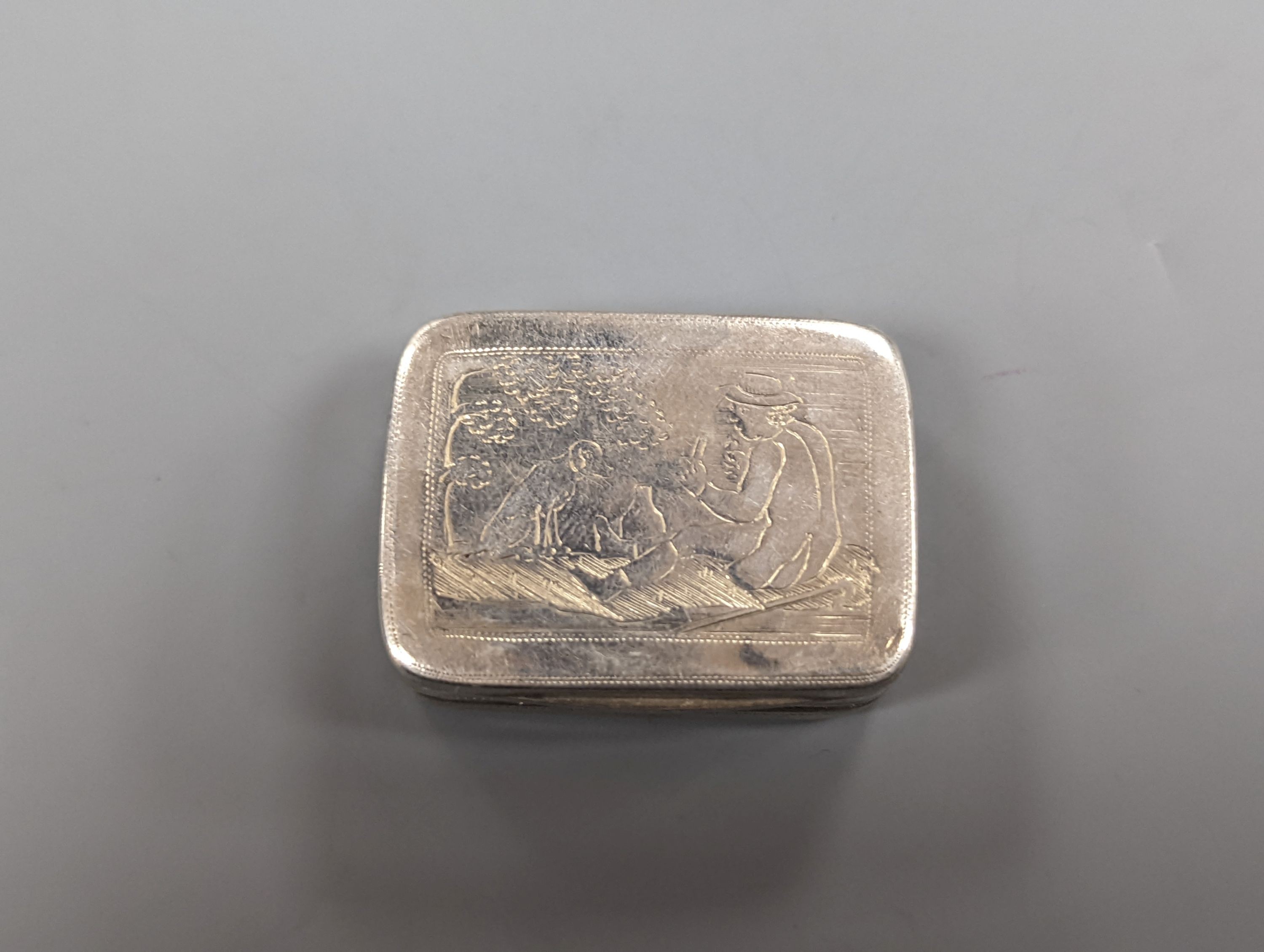 A George III silver vinaigrette, engraved with master and dog, Matthew Linwood, Birmingham, 1811, 30mm.